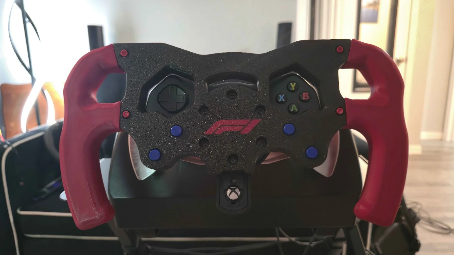 My red and black 3D-printed F1-style Logitech steering wheel conversion